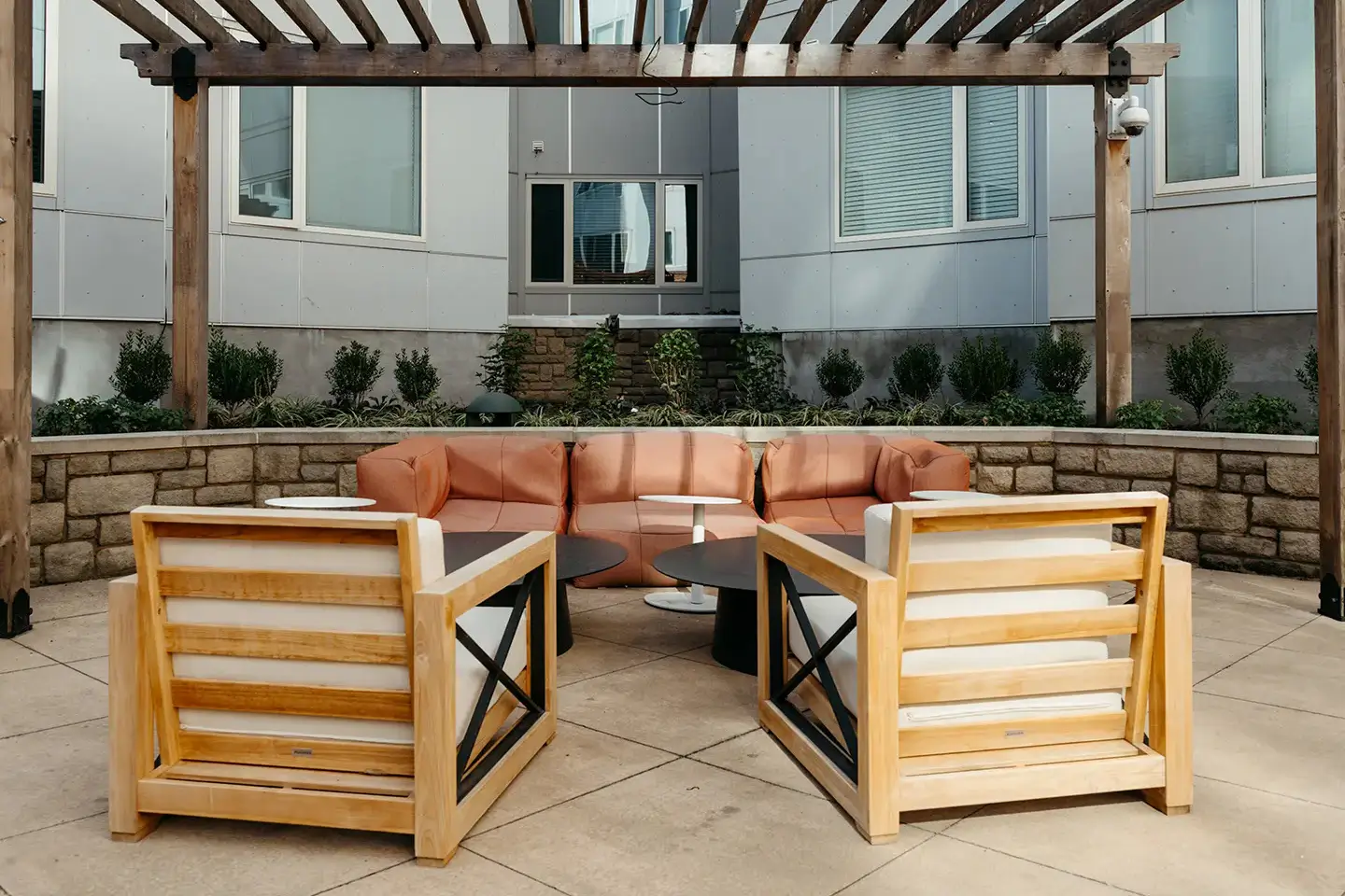Outdoor spaces at the Verge, featuring chairs and couches